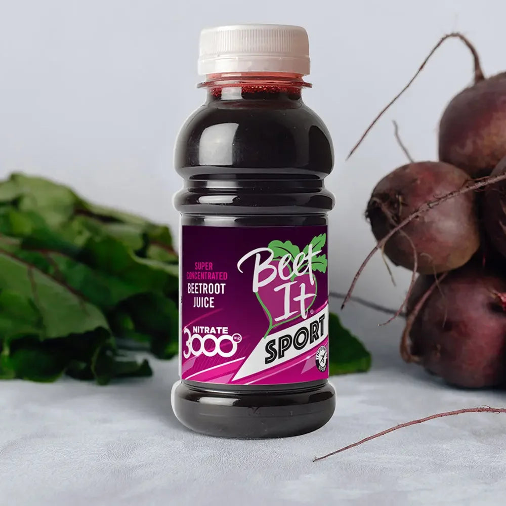Beet It Sport Nitrate 3000 – 8.5 fl. oz. bottle with purple label, shown with fresh beets and leaves. - Beet It US