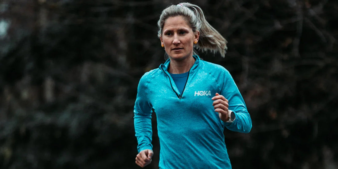Carla Molinaro running during an ultra-endurance event, showcasing her determination and athletic performance powered by Beet It Sport.