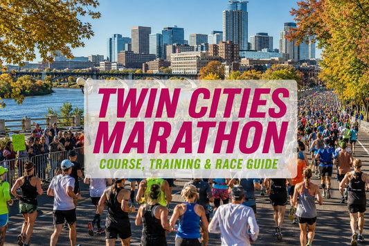 Twin Cities Marathon runners racing through a scenic Minnesota course with fall foliage and city views.