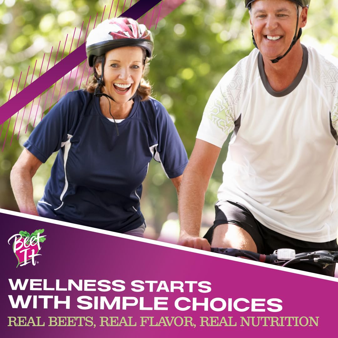Active senior couple riding bicycles, representing the energy and wellness benefits of drinking Beet It organic juice.
