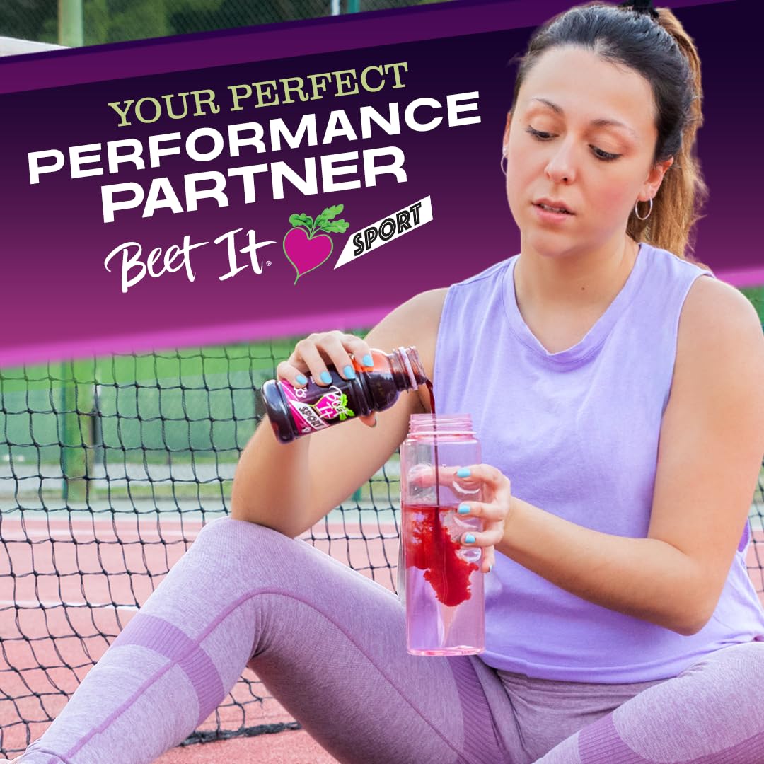 Woman pouring Beet It Sport beetroot juice into bottle before training